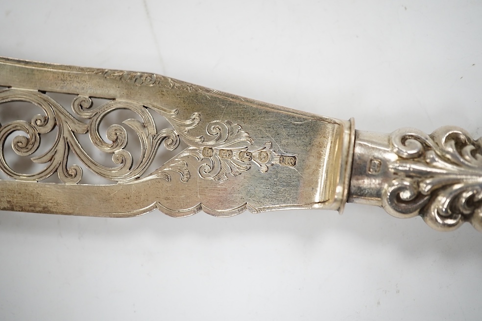 A cased pair of Victorian silver fish servers, John Gilbert?, Birmingham, 1866, knife 31.5cm. Condition - poor